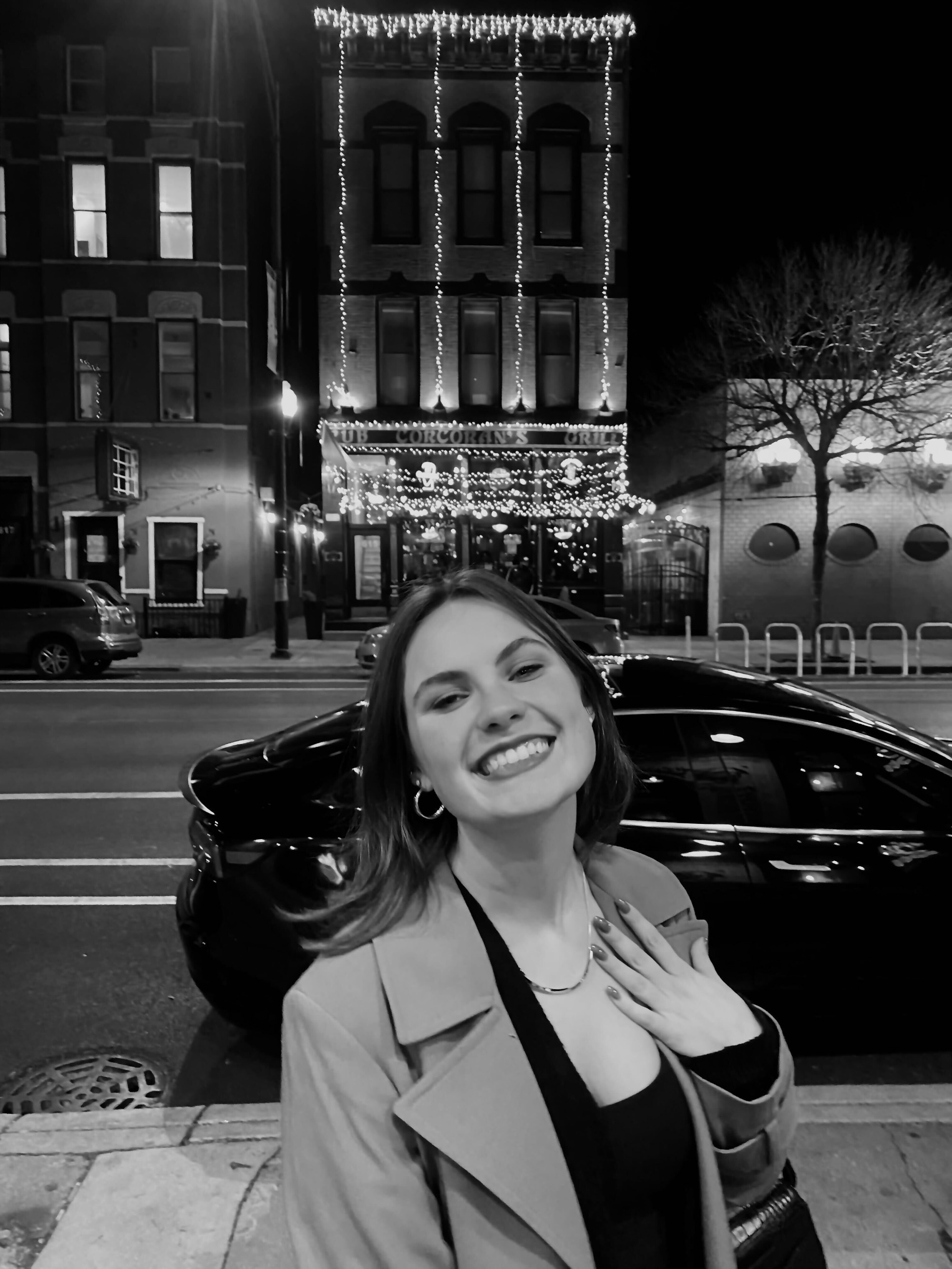 Girl in front of lights in black-and-white